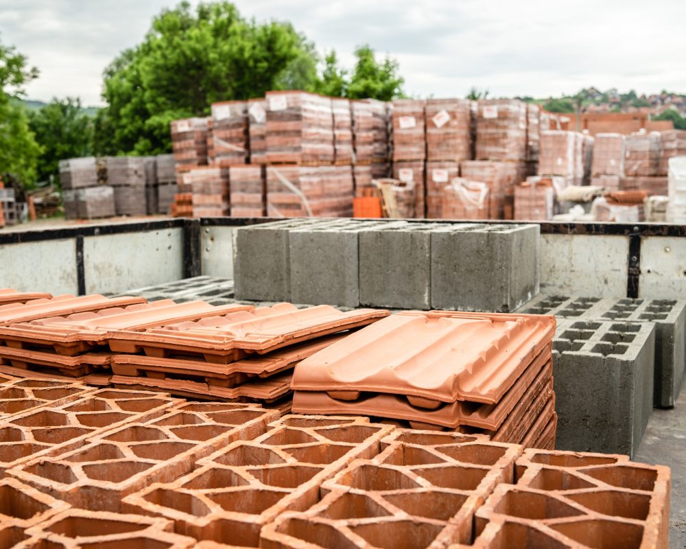 Clay tile and brick blocks concrete at the warehouse loaded in the back of the truck ready for the delivery to the construction site